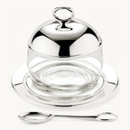 Jam jar with coaster and spoon