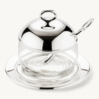 Jam jar with coaster and spoon