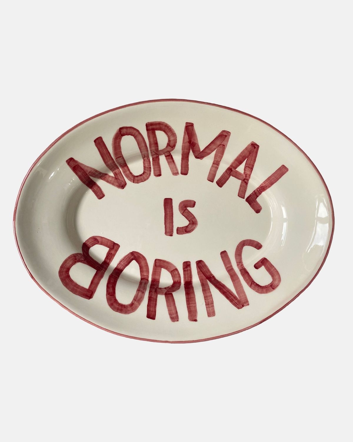 'Normal is boring' serving platter 