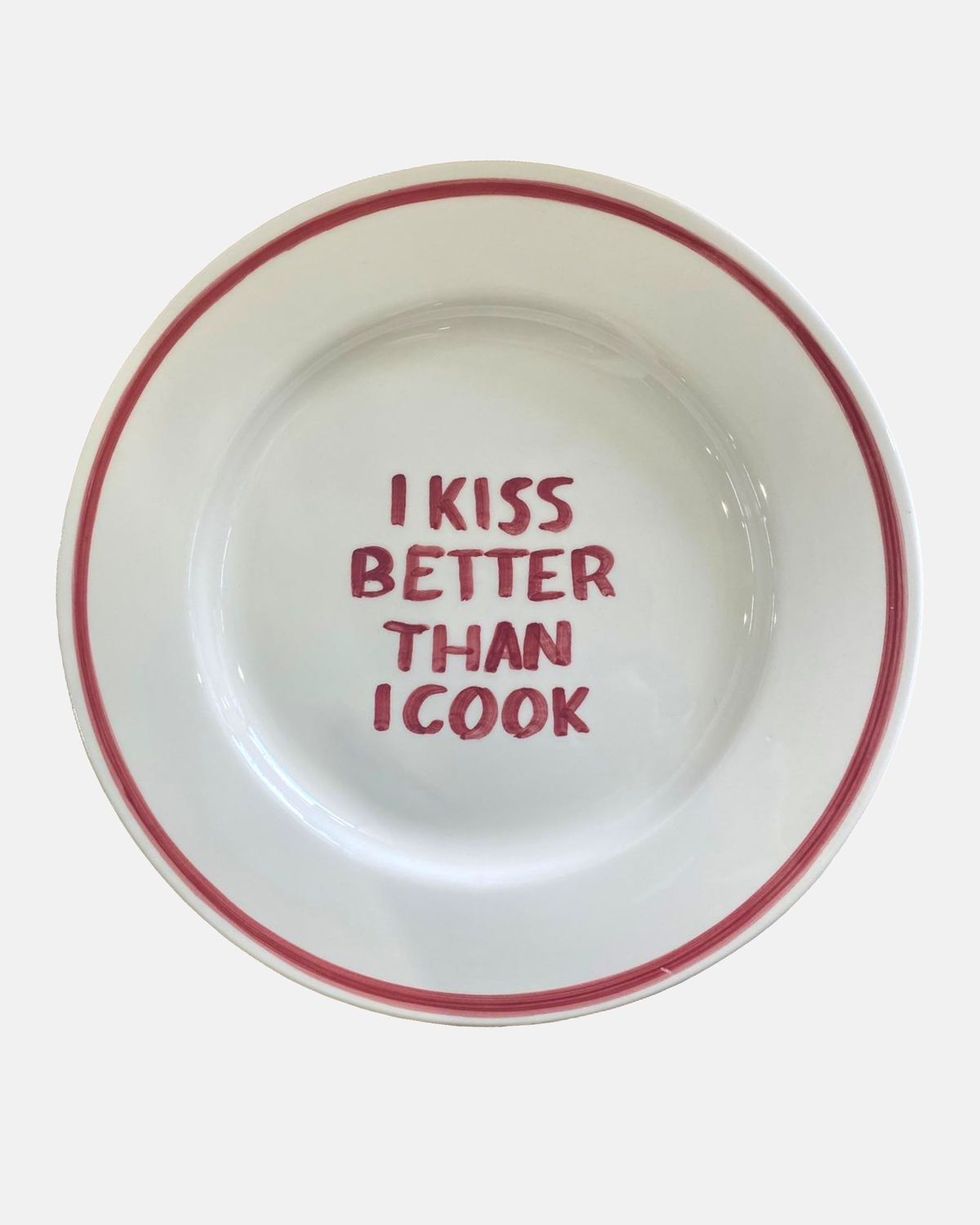 'I kiss better than I cook' bord — ø27cm