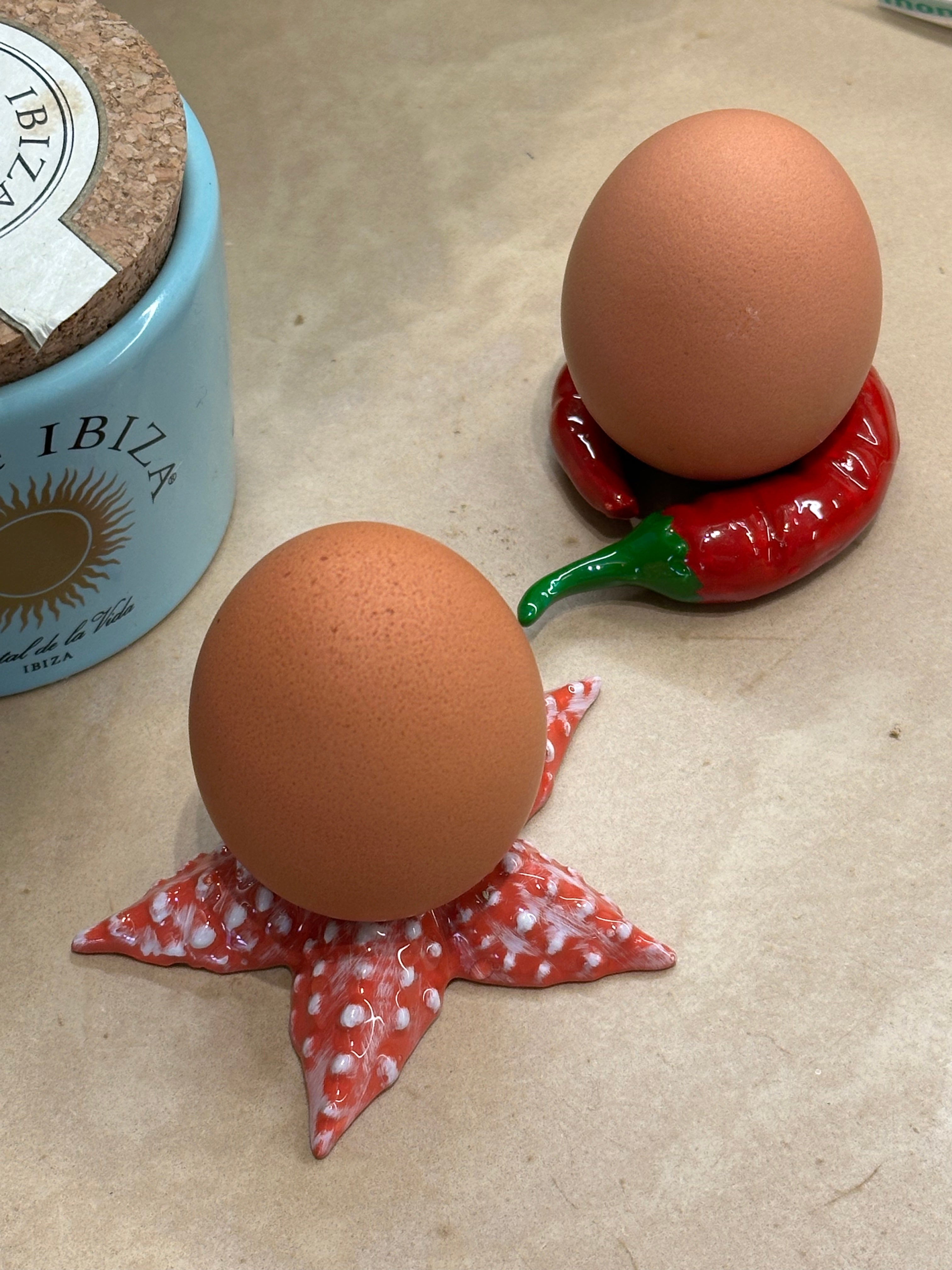 Set van 2 rode peper servetringen / eierdopjes