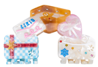 Likio Happy Gingerbread mini hair claws shaped like gifts, front view