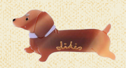 Barrette Likio Caramel Dog en forme de teckel caramel avec logo doré